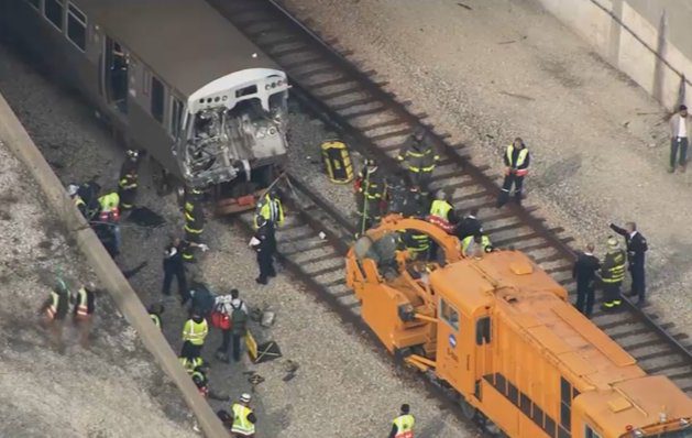 May be an image of 9 people, train and railroad